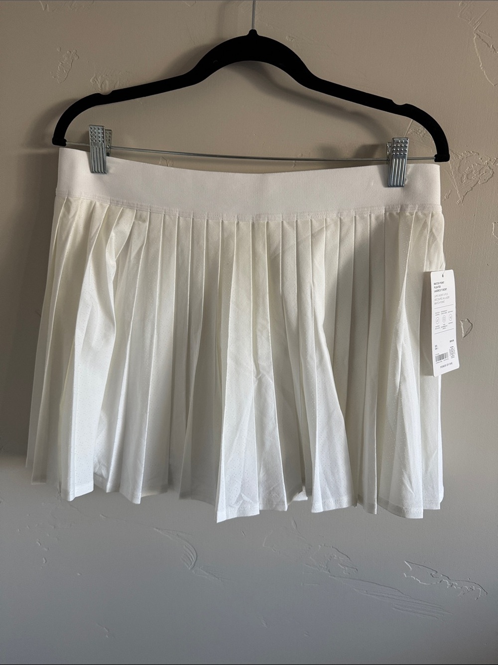Athleta pleated white tennis skirt. New with tags.